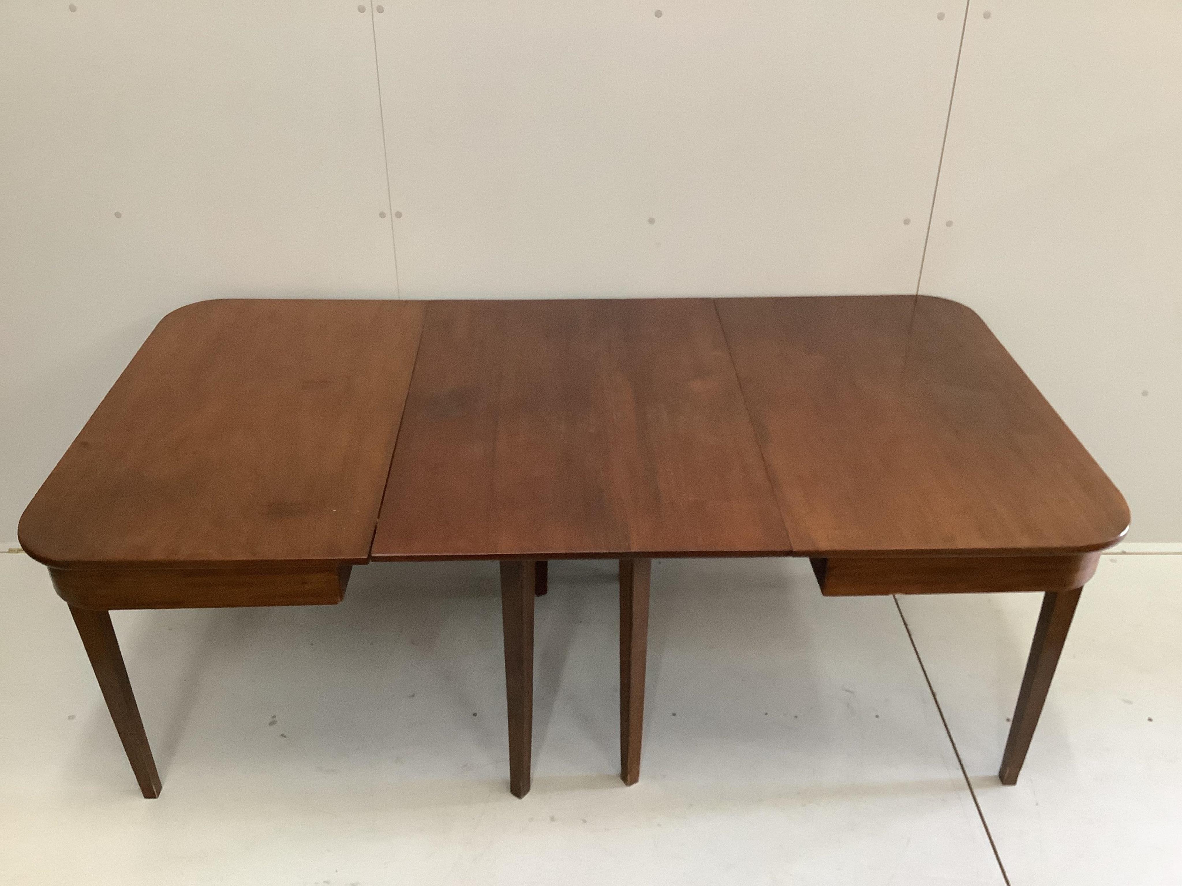A George III mahogany D end extending dining table, later inlay, 122cm extended, depth 97cm, height 72cm. Condition - fair